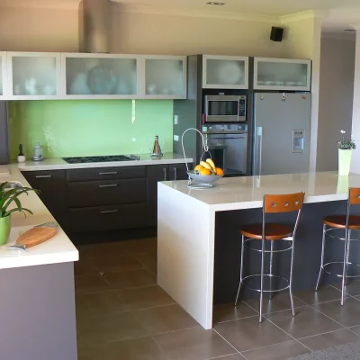 Custom Kitchen with Green Splash Back